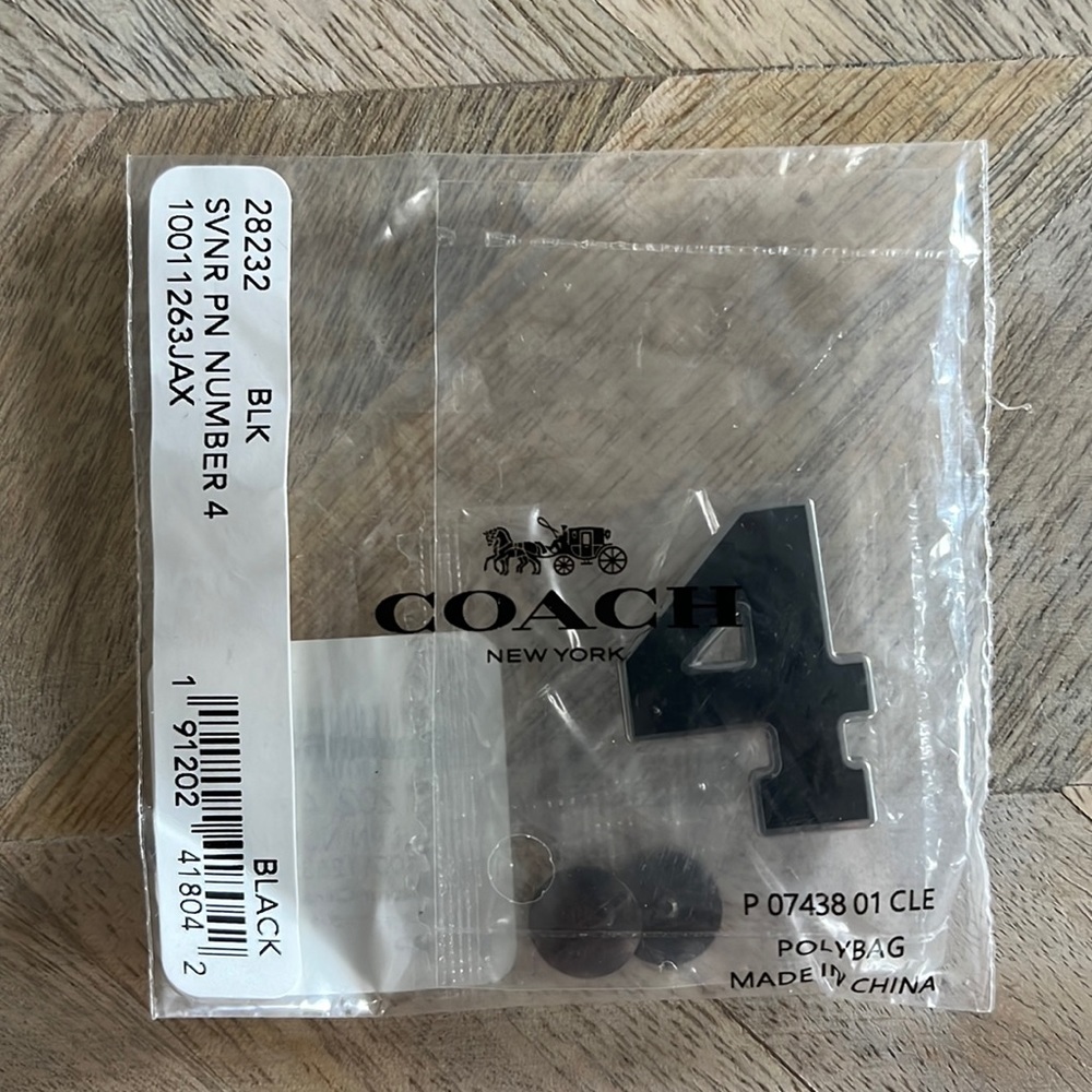 Coach “4” pin